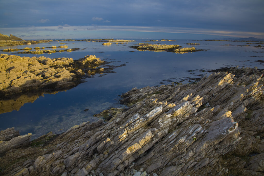 New Zealand, Marlborough, Kaikoura. Coastal limestone outcrops on the Kaikoura Pennisula near the town of Kaikoura.