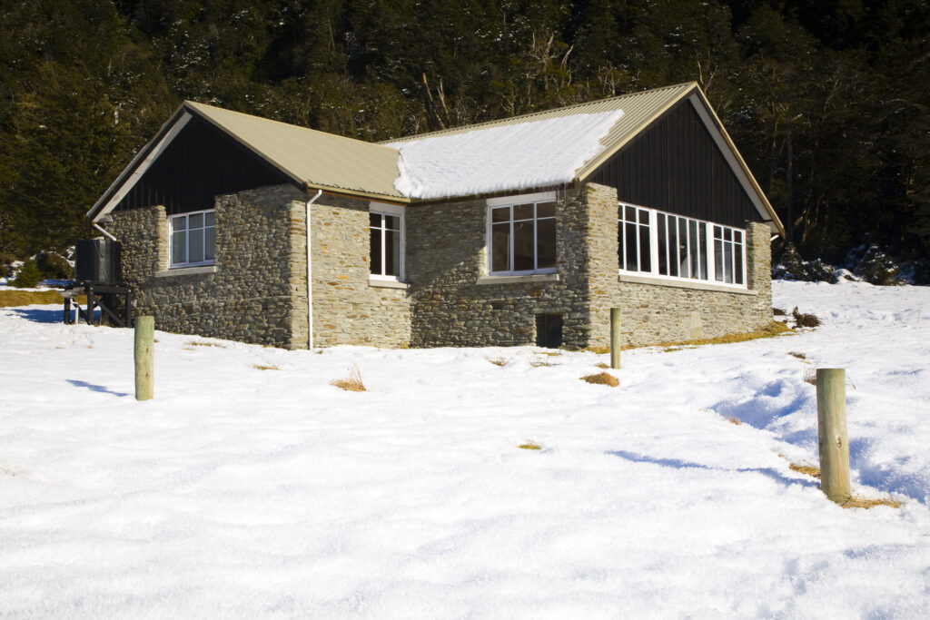 New Zealand, Otago, Mt Aspiring National Park. NZ Alpine Club hut, Aspiring Hut, located in the West Matukituki Valley.