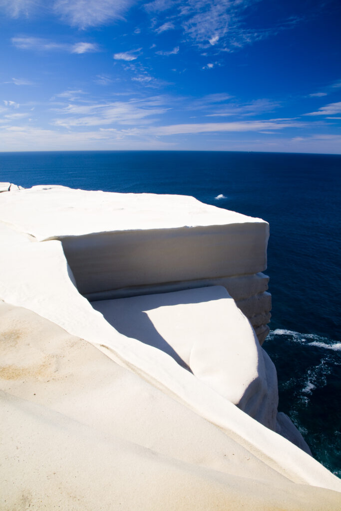 Australia, New South Wales, Royal National Park. Sandstone cliifs overlooking the Pacific Ocean viewed from the Royal National Park Coastal Track.