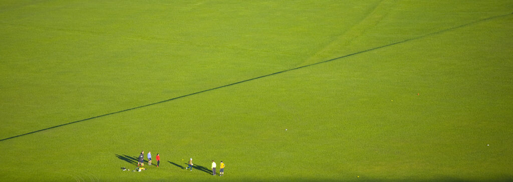 Scotland, Edinburgh, Holyrood Park. People partaking in sports activities at the Holyrood Park.