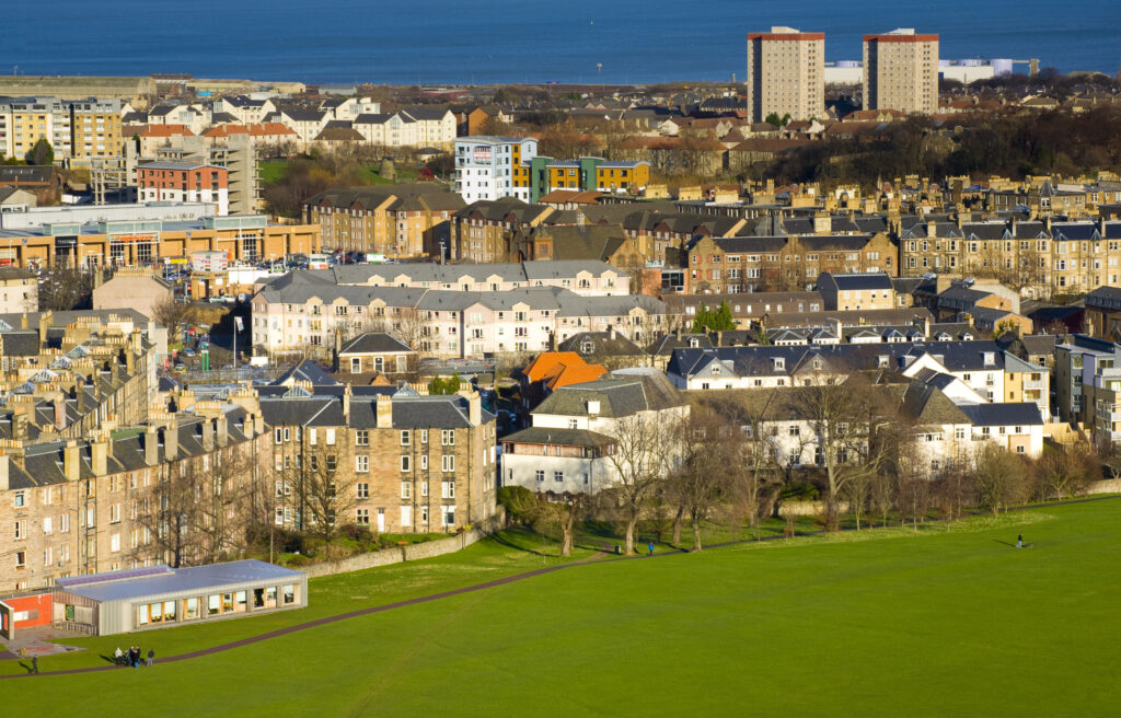 Scotland, Edinburgh, Holyrood Park. People partaking in recreational activities at the Holyrood Park.