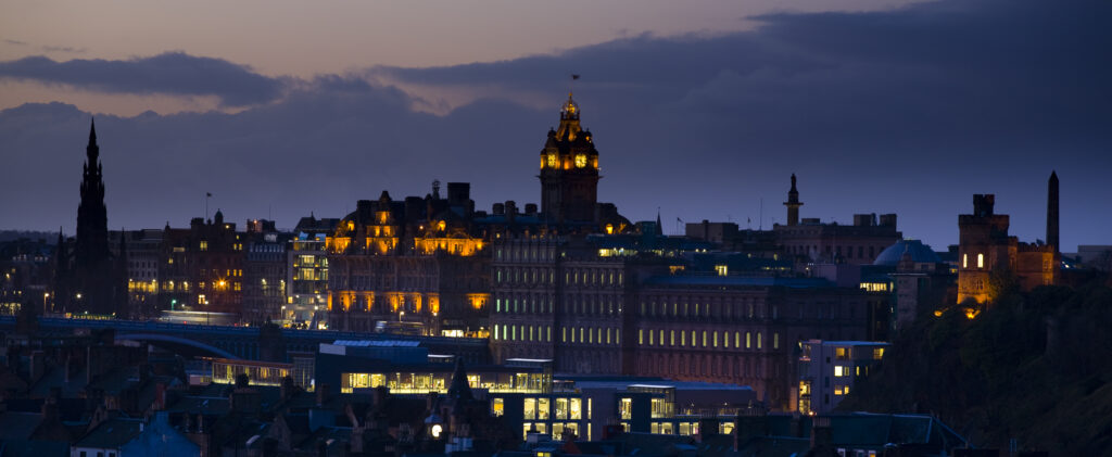 Scotland, Edinburgh, Edinburgh City. Edinburgh skyline with the distinctive landmarks of the Scott Monument, Balmoral Hotel and the Melville Monument.