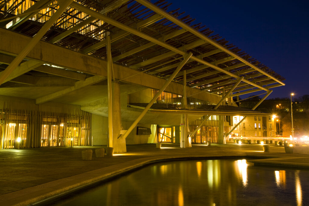 Scotland, Edinburgh, Holyrood. Water feature alongside the main facade of the Holyrood Parliment Building.