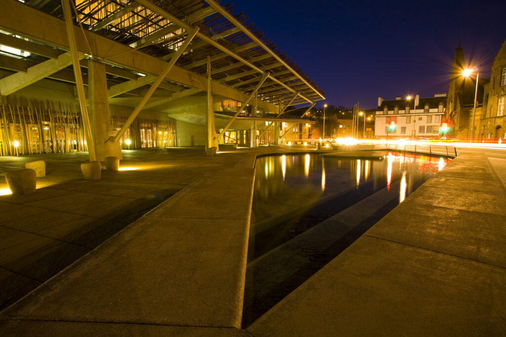 Scotland, Edinburgh, Holyrood. Water feature alongside the main facade of the Holyrood Parliment Building.