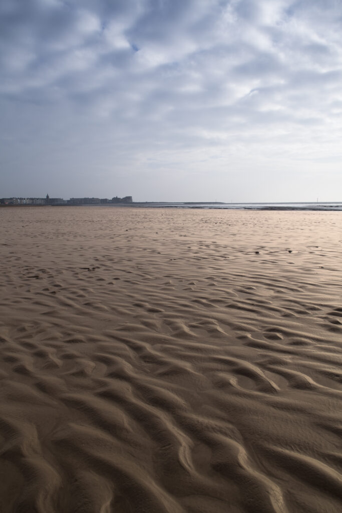 England, Lancashire, Morecambe. Low tide at the seaside resort of Morecambe located on Morecambe Bay.
