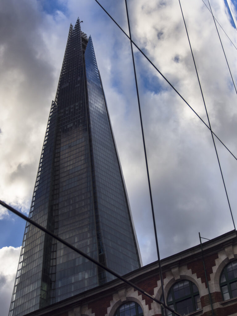 England, London, London Bridge Quater. The Shard, also referred to as the Shard of Glass, Shard London Bridge and formerly London Bridge Tower, is a 72-storey skyscraper in London and is the tallest building in the European Union.