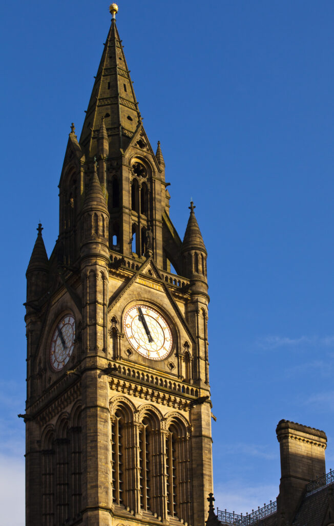 England, Greater Manchester, Manchester. The grand clock tower of the Victorian-era, Neo-gothic Manchester Town Hall.
