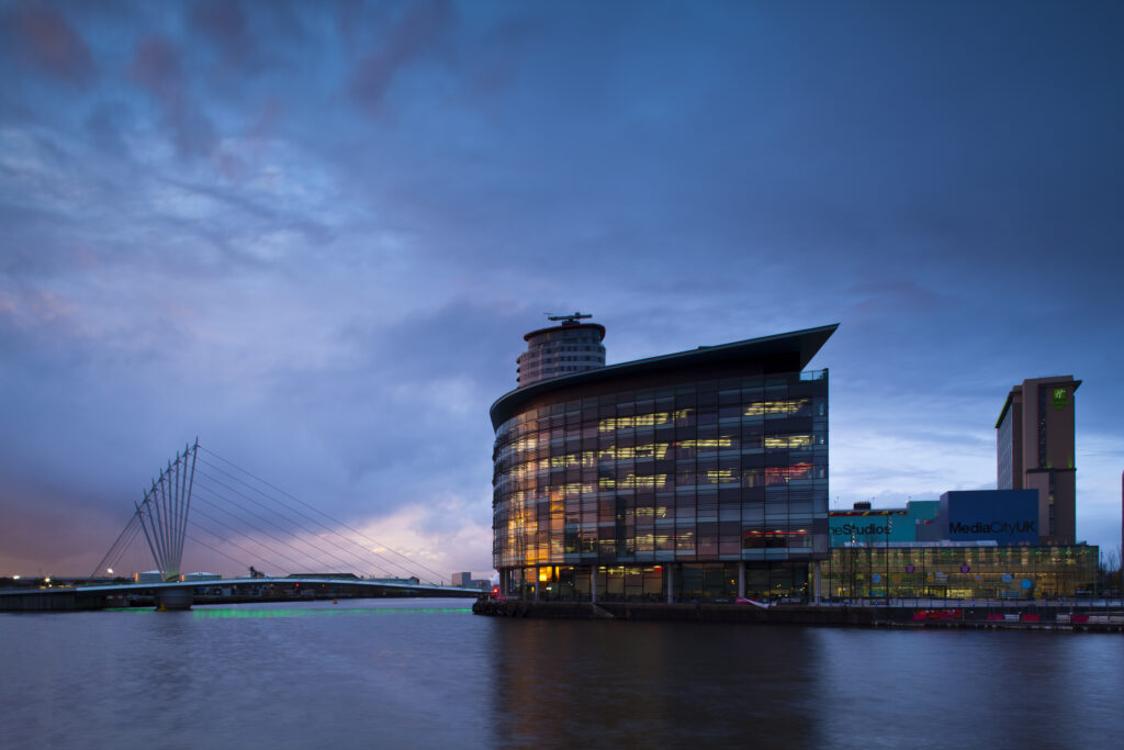England, Greater Manchester, Salford Quays. Swing Bridge and Media City UK buildings located on the Salford Quays in the city of Salford near Manchester Old Trafford.