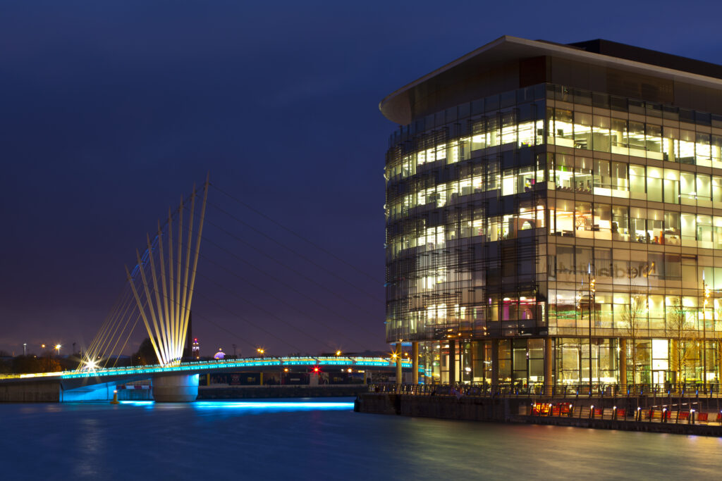 England, Greater Manchester, Salford Quays. Swing Bridge and Media City UK buildings located on the Salford Quays in the city of Salford near Manchester Old Trafford.