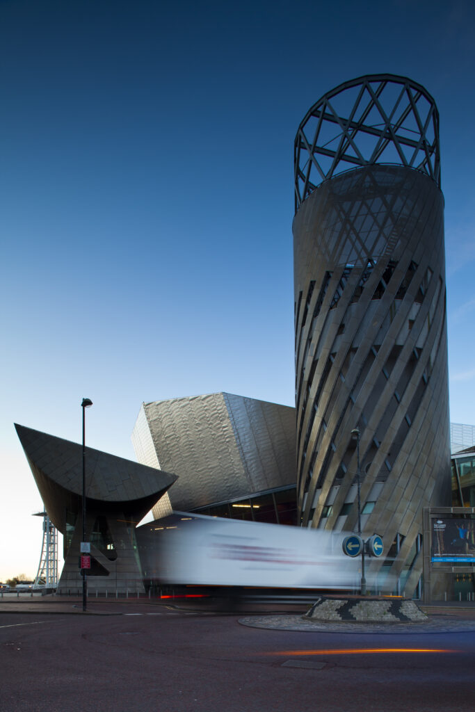 England, Greater Manchester, Salford Quays. Traffic near the Lowry Centre, located on the Salford Quays in the city of Salford near Manchester Old Trafford.