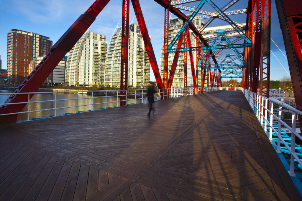 England, Greater Manchester, Salford Quays. NV apartments and Detroit Bridge located along the Manchester Ship Canal in Salford.