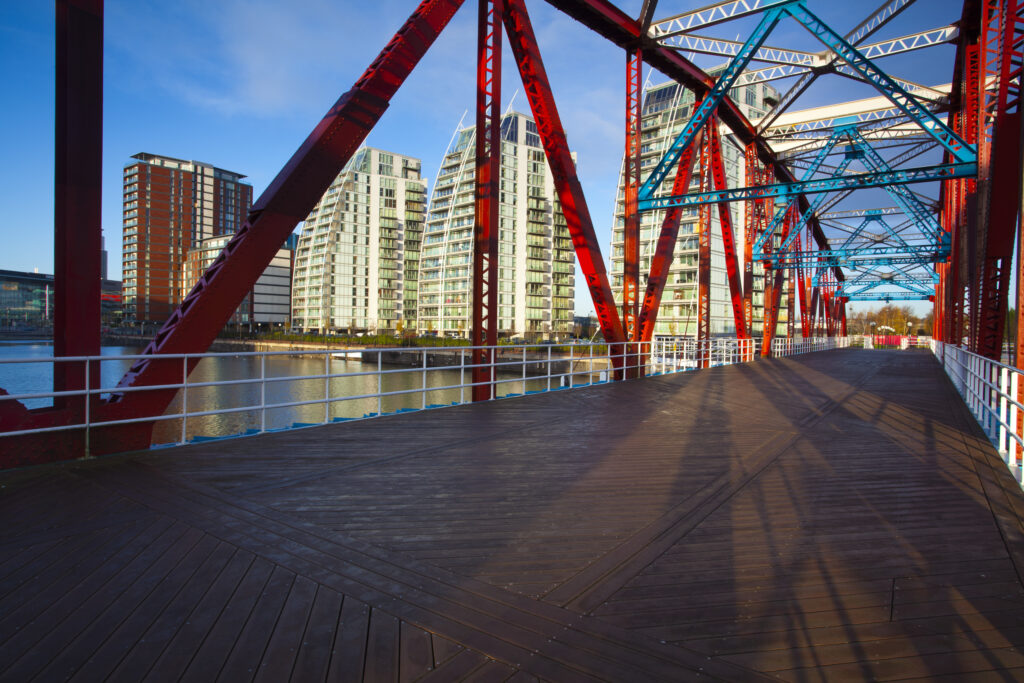 England, Greater Manchester, Salford Quays. NV apartments and Detroit Bridge located along the Manchester Ship Canal in Salford.