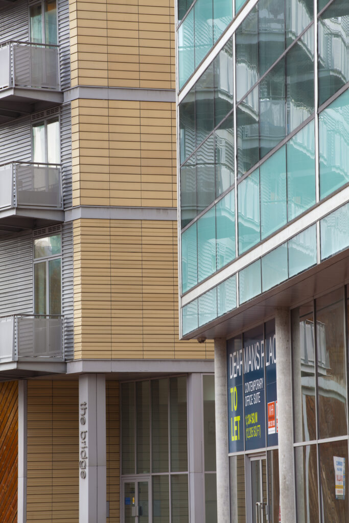 England, Greater Manchester, Manchester. Detail shot of the Bridge apartments on the banks of the River Irwell near the Trinity Bridge.