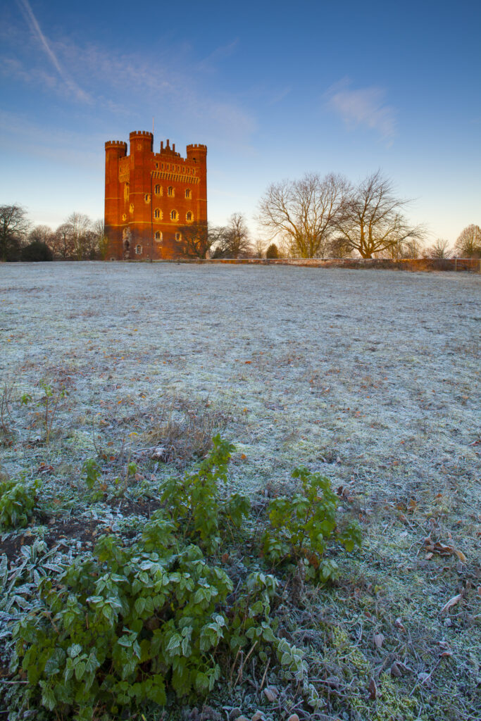 England, Lincolnshire, Tattershall Castle. Tattershall Castle, a red-brick medieval castle built by Ralph Cromwell, Lord Treasurer of England in 1434, on a frosty winters morning.
