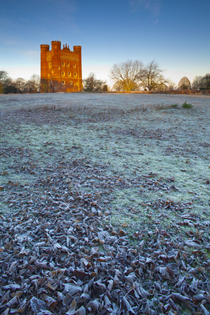 England, Lincolnshire, Tattershall Castle. Tattershall Castle, a red-brick medieval castle built by Ralph Cromwell, Lord Treasurer of England in 1434, on a frosty winters morning.