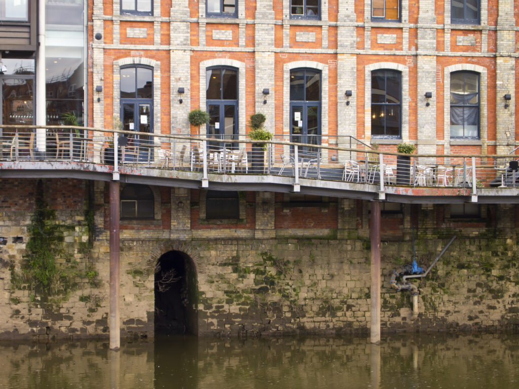 England, North Yorkshire, York City. Cafe and restaurant located in old warehouses on the River Ouse.