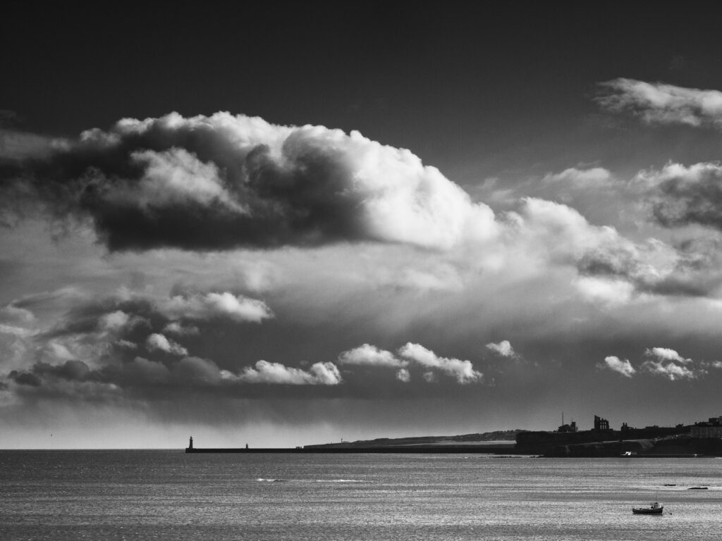 England, Tyne & Wear, Tynemouth. View looking south from headland near Cullercoats towards the Mouth of the Tyne and Tynemouth Priory.