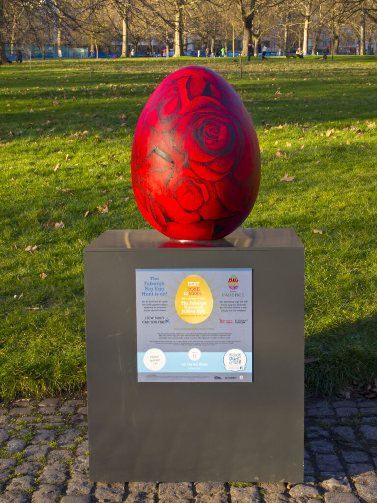 England, London, Green Park. Red easter egg maerking the 2012 easter egg hunt in the royal parks of london.