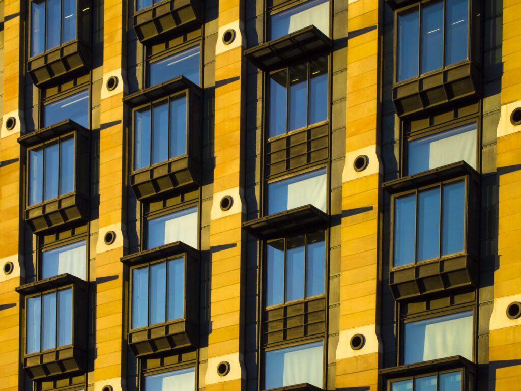 England, Greater London, City of Westminster. Detail of windows in modern office building.