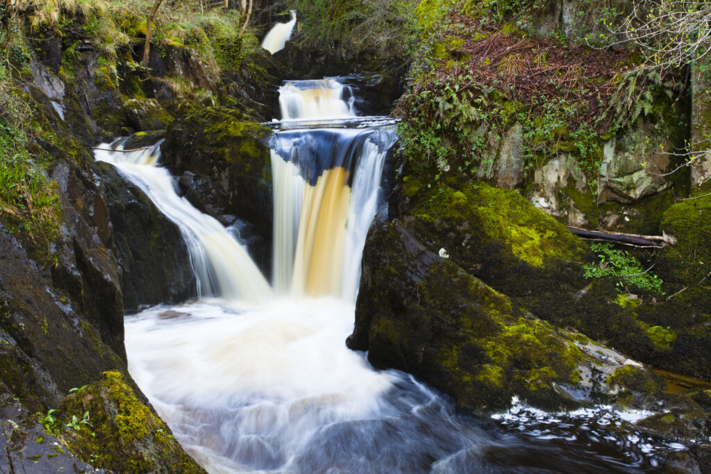 England, North Yorkshire, Ingleton. Pecca Twin Falls, a cascade along the Ingleton Waterfalls Walk.