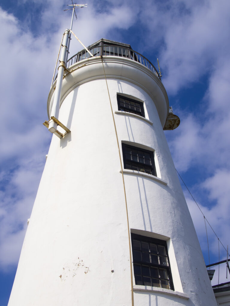England, North Yorkshire, Scarborough. Scarborough Lighthouse located in Scarborough Harbour, a working fishing harbour in North Yorkshire.