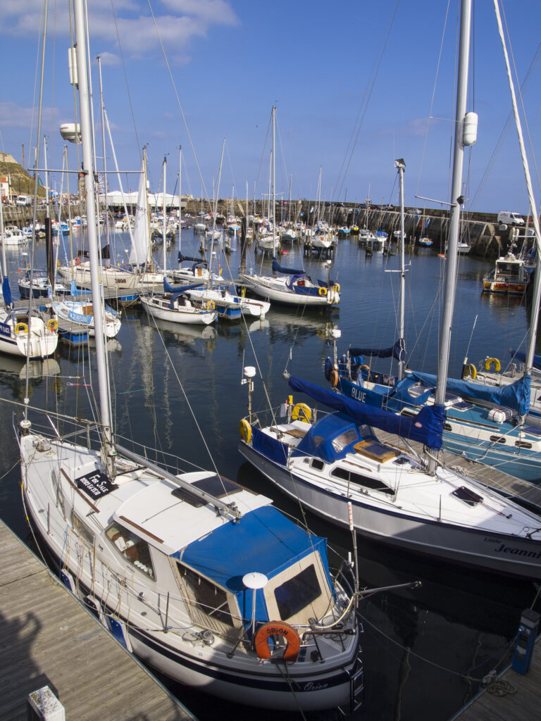 England, North Yorkshire, Scarborough. Boats moored in Scarborough Harbour, a working fishing harbour in North Yorkshire.