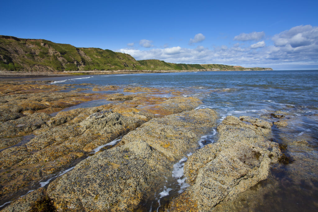 England, North Yorkshire, Scarborough. Scalby Ness Sands, located north of Scarborough within the North York Moors National Park.