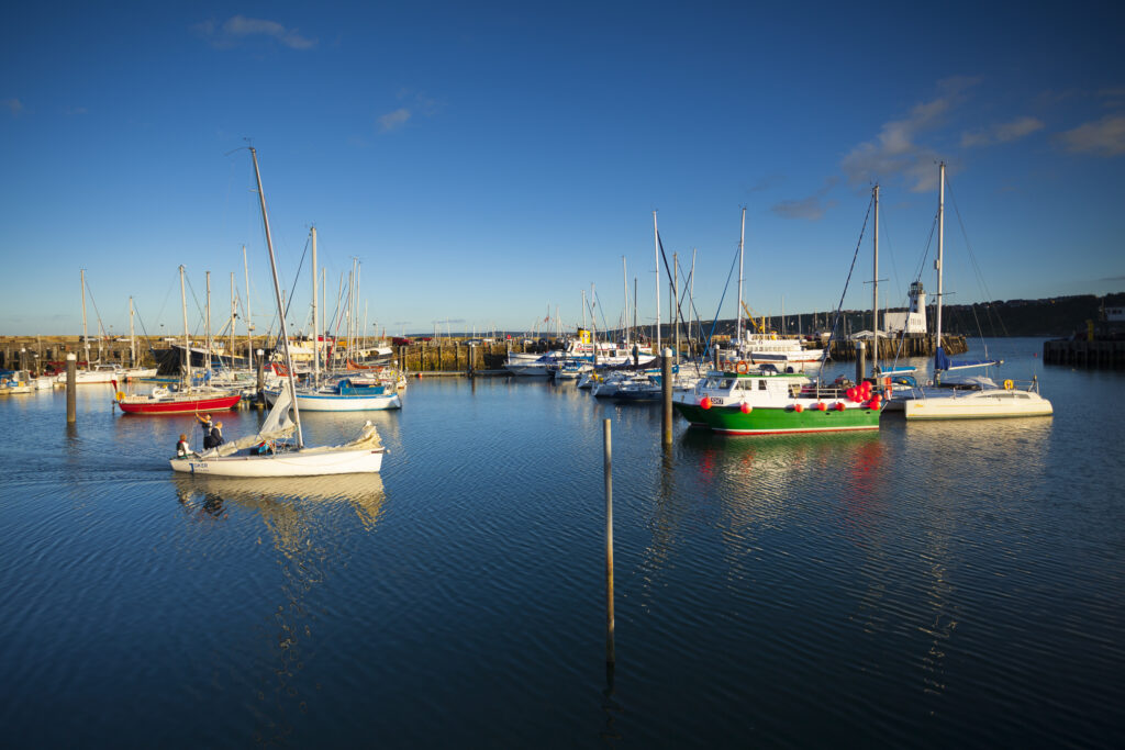 England, North Yorkshire, Scarborough. Boats moored in Scarborough Harbour, a working fishing harbour in North Yorkshire.