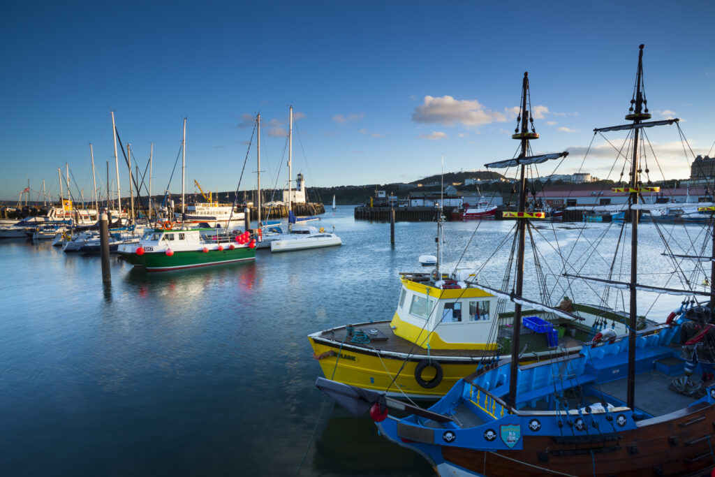 England, North Yorkshire, Scarborough. Boats moored in Scarborough Harbour, a working fishing harbour in North Yorkshire.