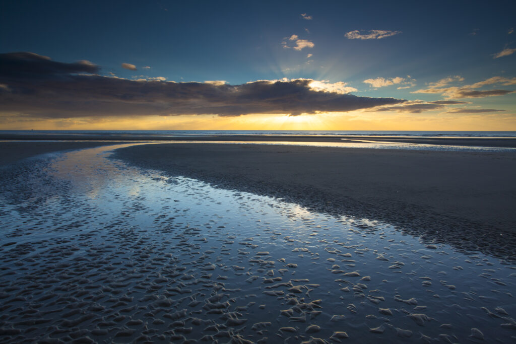 England, Lancashire, Blackpool. Sunset viwed from the South Shore at Blackpool.