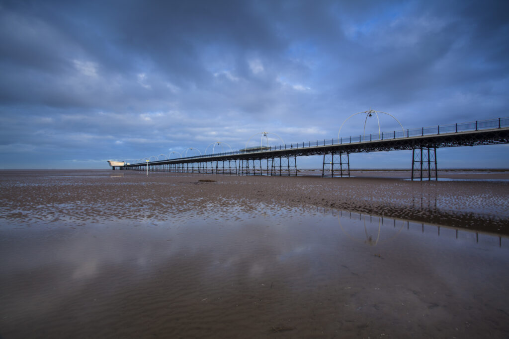 England, Merseyside, Southport. Southport Pier at dawn.