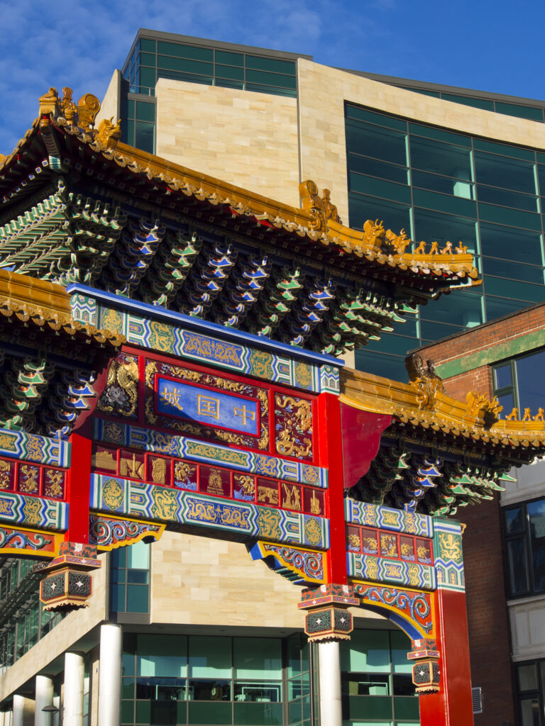 England, Tyne and Wear, Newcastle Upon Tyne. Detail of Chinese artwork and design on the Chinese Arch heralding the entry into the China Town area of Newcastle.