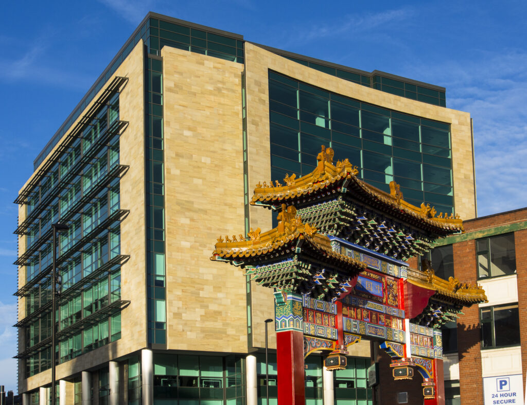 England, Tyne and Wear, Newcastle Upon Tyne. Detail of Chinese artwork and design on the Chinese Arch heralding the entry into the China Town area of Newcastle.