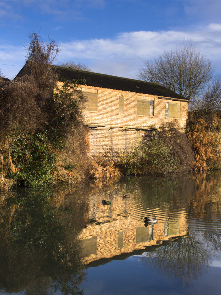 England, West Midlands, Stourbridge Canal. Industrial unit located on the Stourbridge Canal near Brierley Hill in the Black Country.
