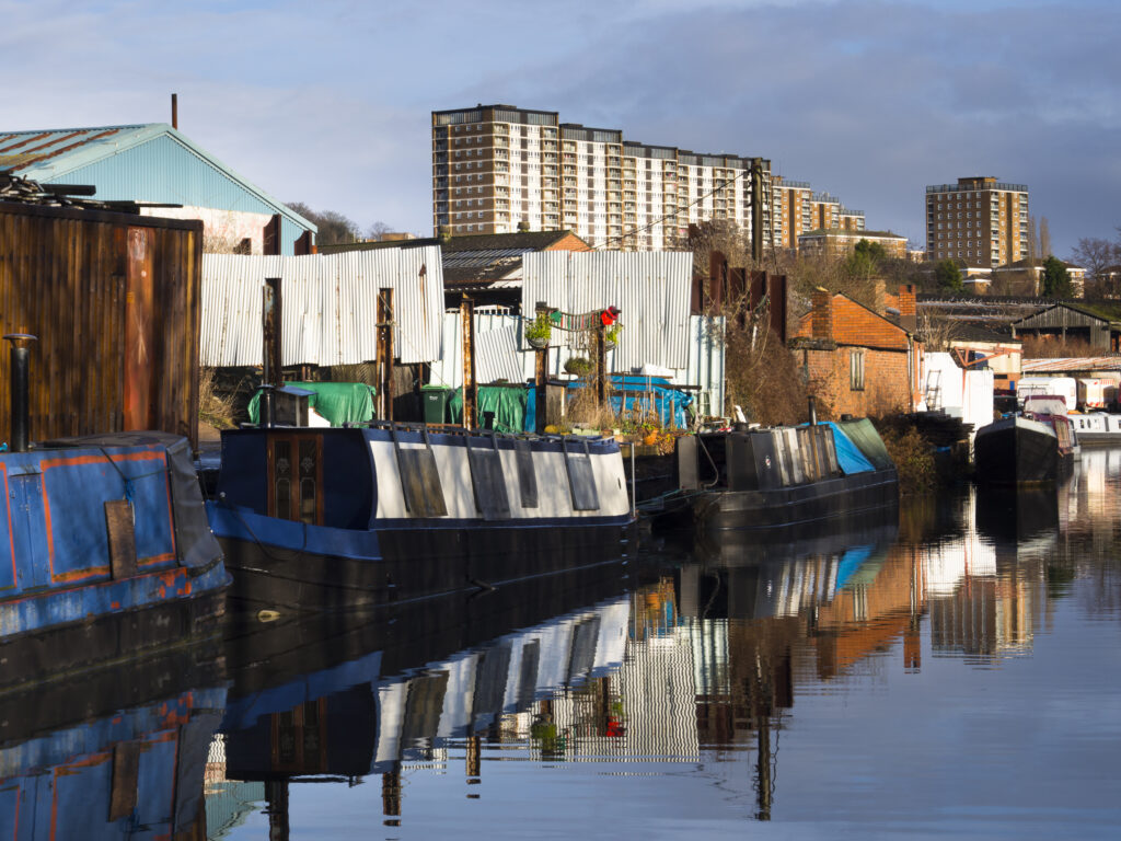 England, West Midlands, Stourbridge Canal. Narrowboats moored at Delph Marine, known locally as the boat yard, located near the Delph Nine Locks at Brierley Hill in the Black Country.