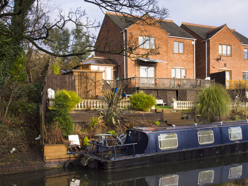 England, West Midlands, Stourbridge Canal. Narrowboats moored near the Delph Nine Locks at Brierley Hill in the Black Country.