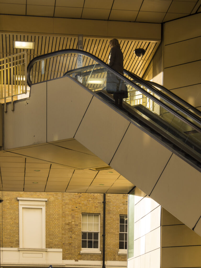 England, London, Southwark. Elevator forming part of a business and retail develpoment near the river thames.