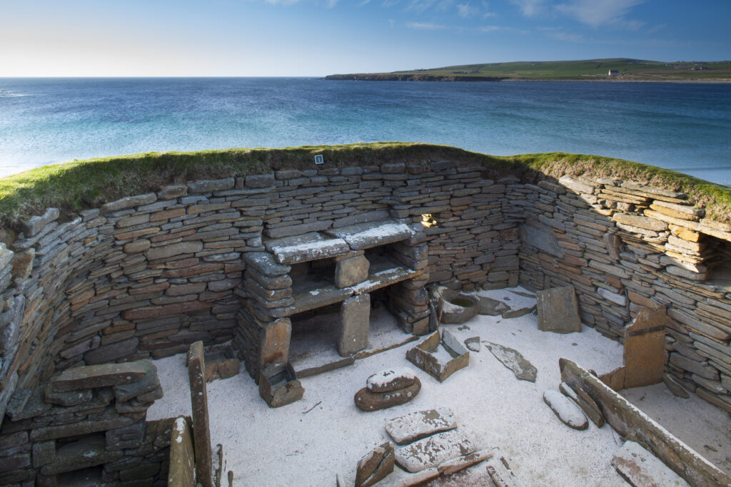 Scotland, Orkney Islands, Skara Brae Prehistoric Village. Skara Brae, a stone-built Neolithic settlement, located on the Bay of Skaill on the west coast of Mainland Orkney and forming part of the Heart of Neolithic Orkney World Heritage Site