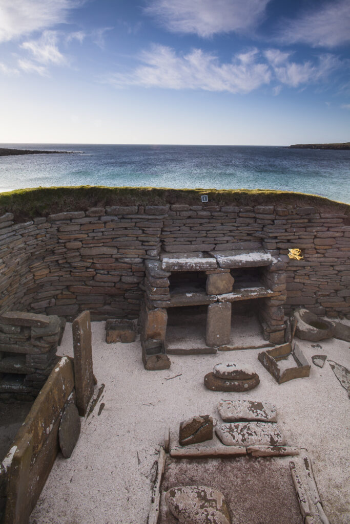 Scotland, Orkney Islands, Skara Brae Prehistoric Village. Skara Brae, a stone-built Neolithic settlement, located on the Bay of Skaill on the west coast of Mainland Orkney and forming part of the Heart of Neolithic Orkney World Heritage Site