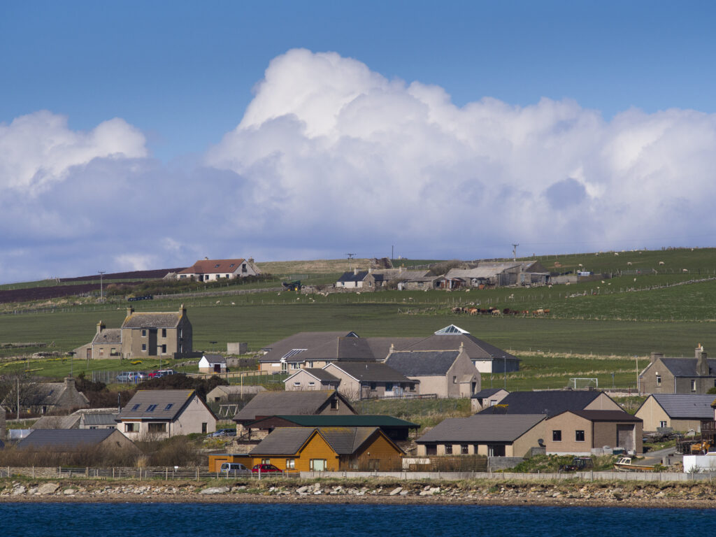 Scotland, Orkney Islands, Burray. Small farming settlement and agriculture land on the Orkney island of Burray.