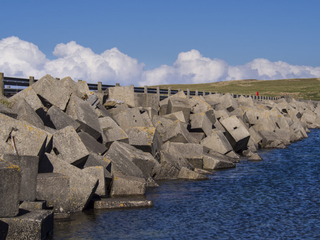 Scotland, Orkney Islands, Churchill Barrier. Churchill Barrier No. 3, linking Glimps Holm and Burray, built by prisoners of war in WW2 to protect the Royal Navy anchorage in Scapa Flow from German U-boats.