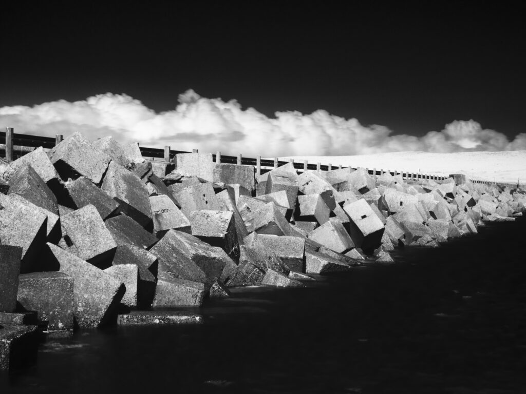 Scotland, Orkney Islands, Churchill Barrier. Churchill Barrier No. 3, linking Glimps Holm and Burray, built by prisoners of war in WW2 to protect the Royal Navy anchorage in Scapa Flow from German U-boats.