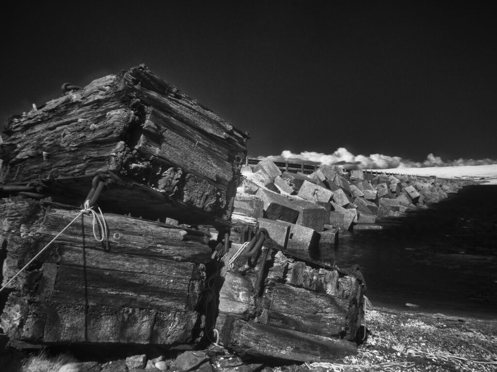 Scotland, Orkney Islands, Churchill Barrier. Churchill Barrier No. 3, linking Glimps Holm and Burray, built by prisoners of war in WW2 to protect the Royal Navy anchorage in Scapa Flow from German U-boats.