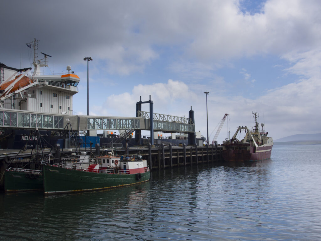 Scotland, Orkney Islands, Mainland Orkney. A variety of sea boats moored in Stromness Harbour on mainland Orkney.