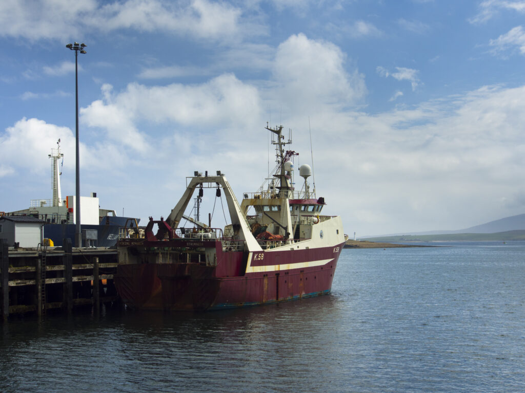 Scotland, Orkney Islands, Mainland Orkney. A variety of sea boats moored in Stromness Harbour on mainland Orkney.