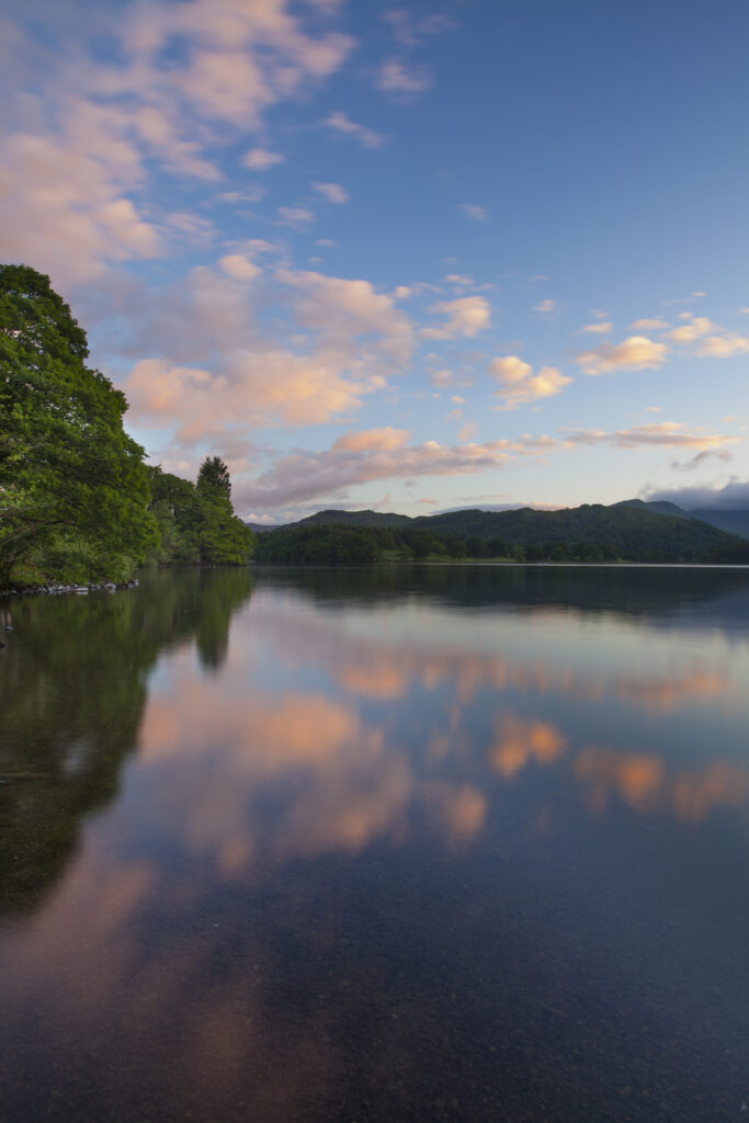 England, Cumbria, Lake District National Park. Sunrise on Lake Windermere, viewed from Low Wray.