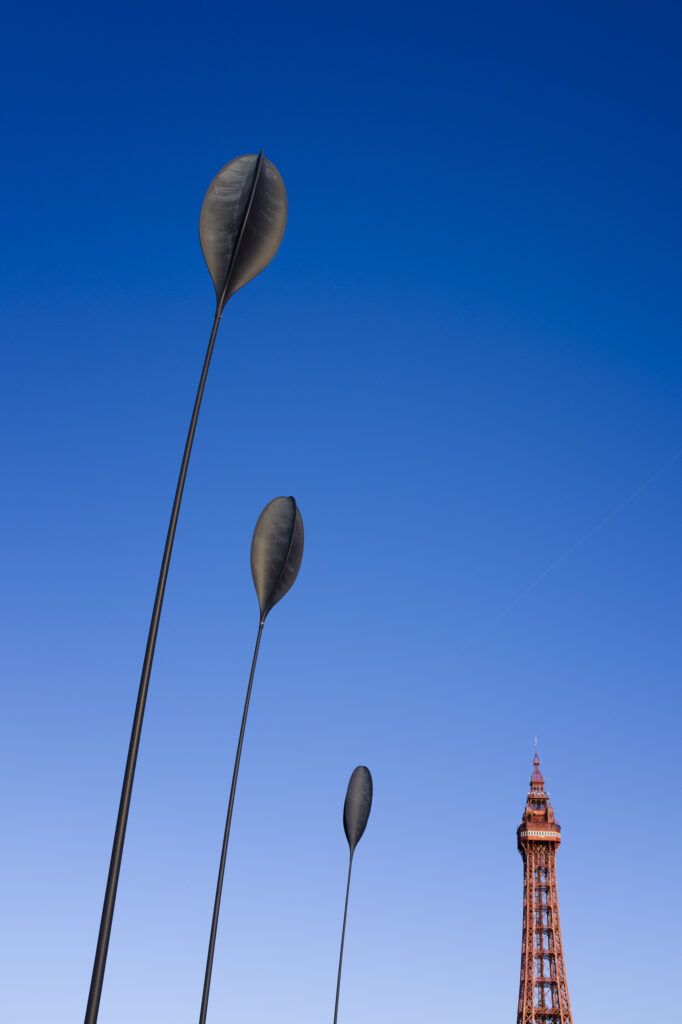 England, Lancashire, Blackpool. Blackpool Tower and the Golden Mile on the Blackpool sea front.