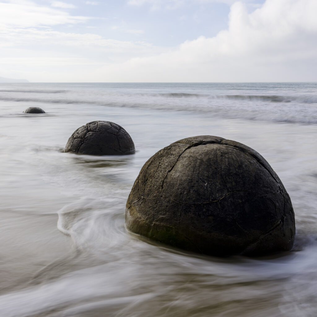 New Zealand, Otago, Moeraki Boulders. The famous spherical Moeraki boulders on the North Otago coast.