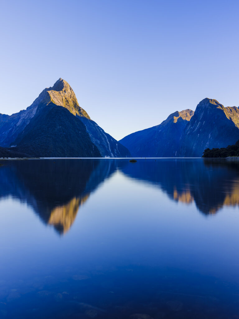 New Zealand, South Island, Fiordland National Park. A calm morning at the Milford Sound in Fiordland National Park.