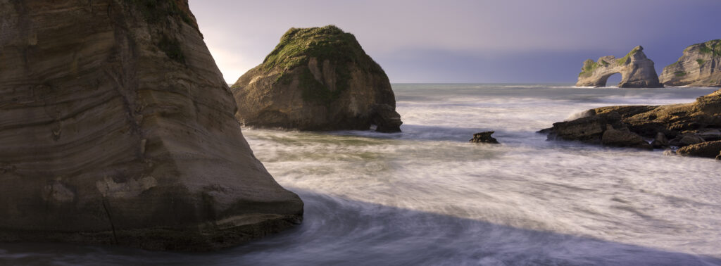 New Zealand, South Island, Wharariki Beach. Wharariki Beach and the the Archway Islands located near Cape Farewell and the Kahurangi National Park.